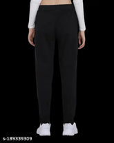 Black cotton blend knee-length trendy women's pyjamas with elastic waistband and drawstring closure, featuring stylish side pockets for daily wear or gym. Comfortable for sleep, workout, or outdoor activities. Made in India (S, M, L, XL, XXL)